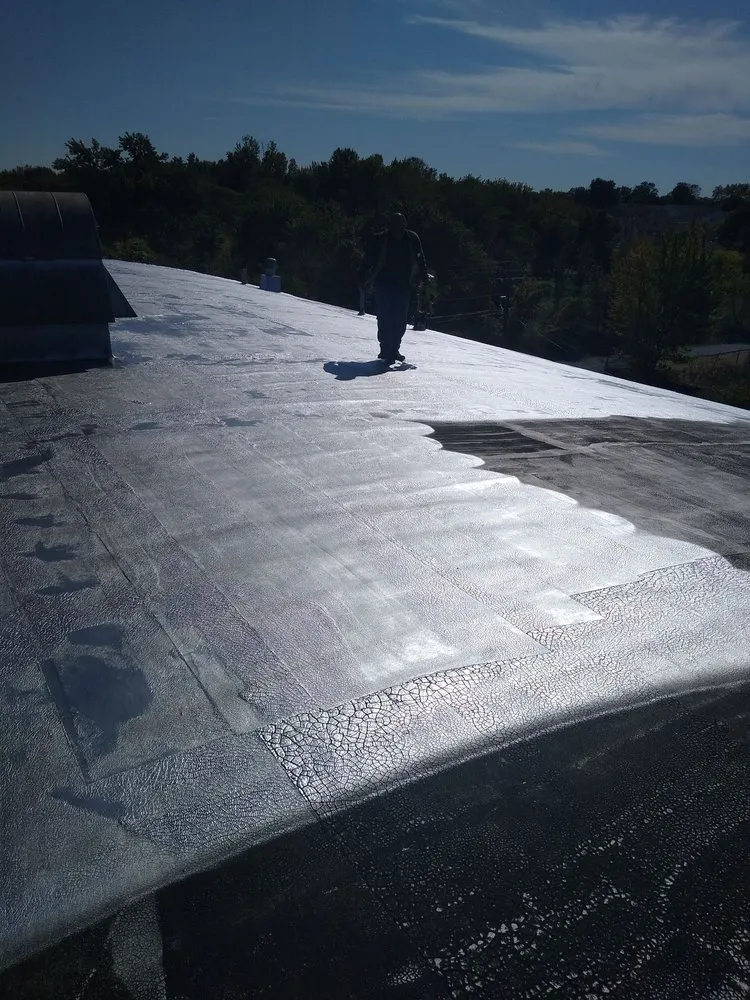 Slide of D & E Roofing and Paving