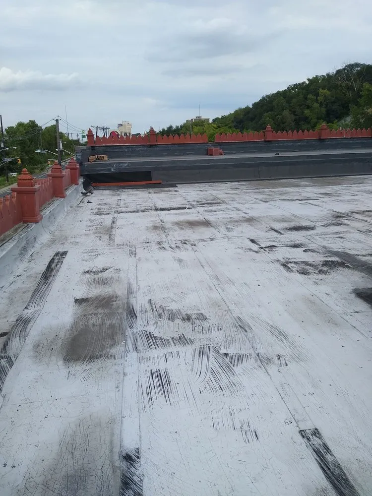 Slide of D & E Roofing and Paving