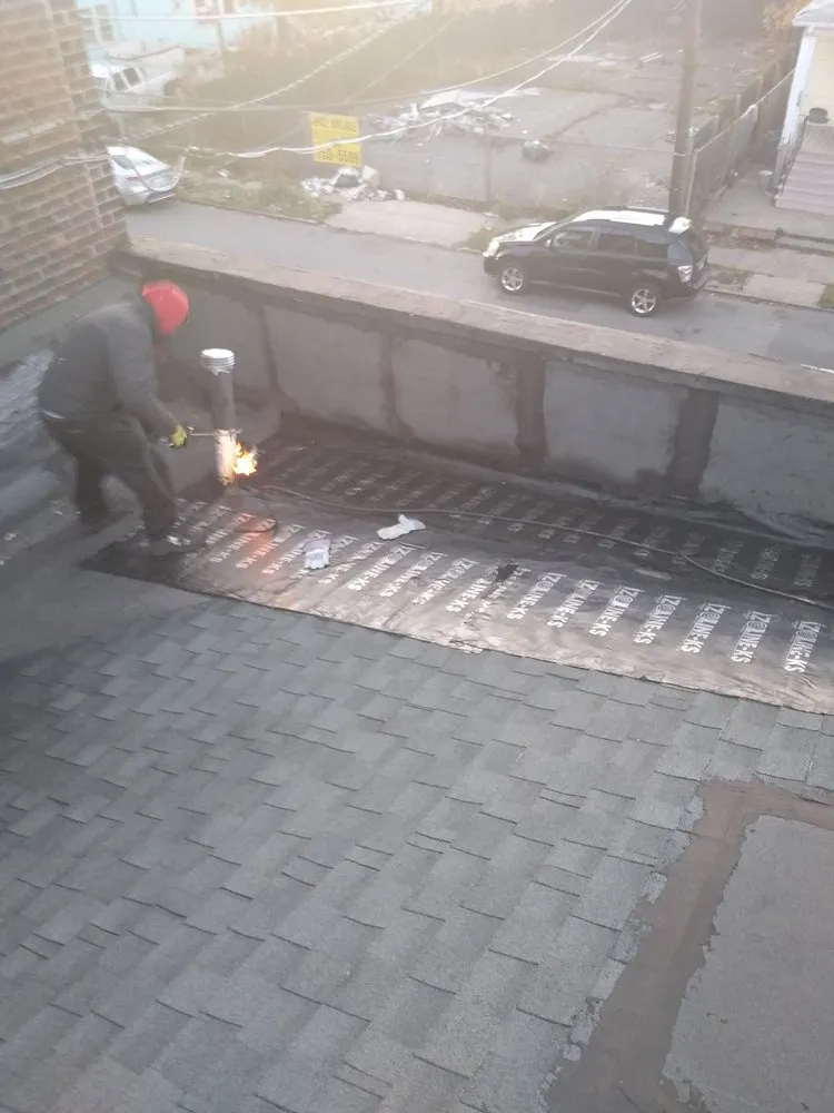 Slide of D & E Roofing and Paving