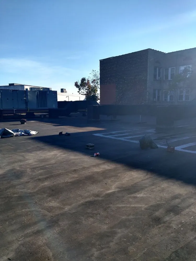 Slide of D & E Roofing and Paving