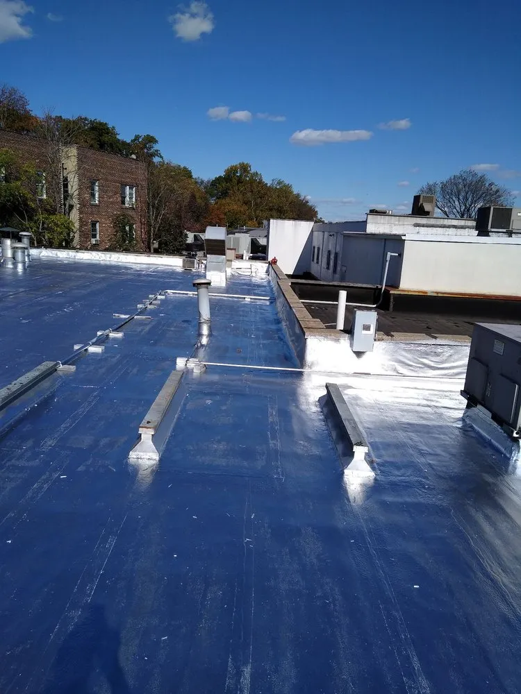 Slide of D & E Roofing and Paving