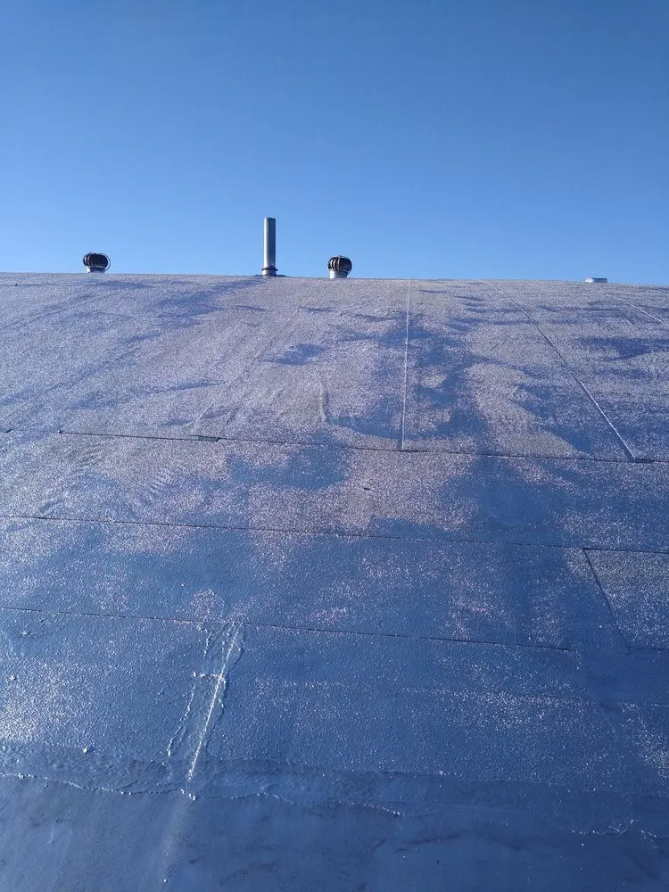 Slide of D & E Roofing and Paving