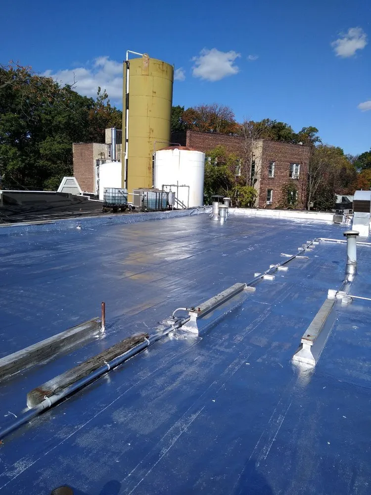 Slide of D & E Roofing and Paving