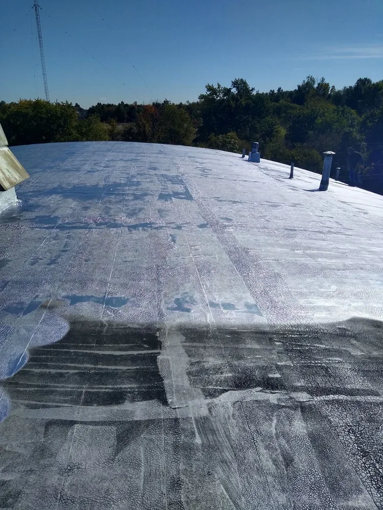 Slide of D & E Roofing and Paving