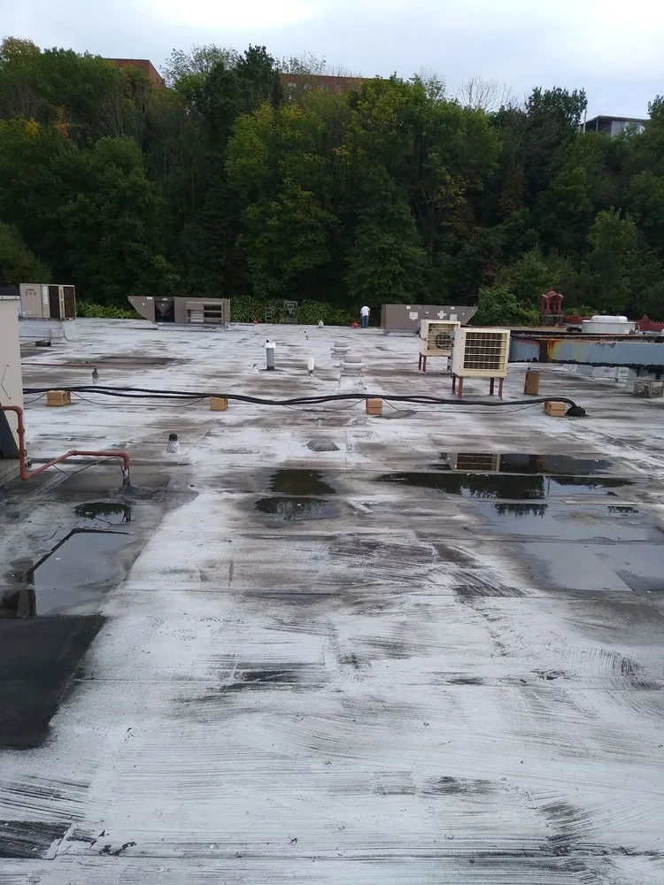 Slide of D & E Roofing and Paving