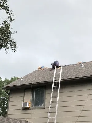 D A Roofing And Gutters Logo