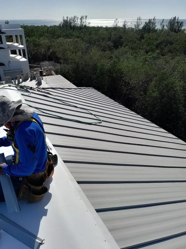 Slide of D’ Roofing Group