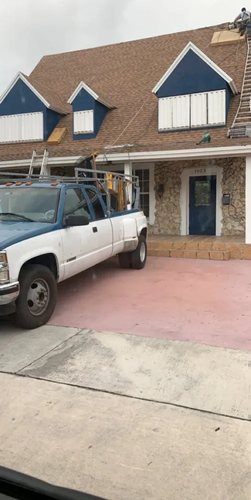 Slide of D-Tech Roofing