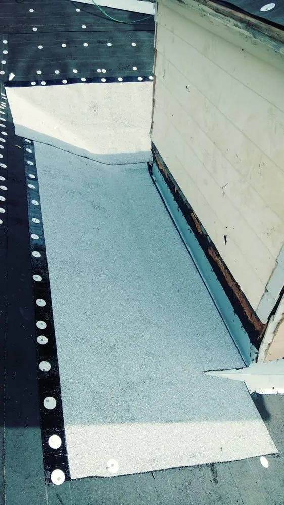 Slide of D-Tech Roofing