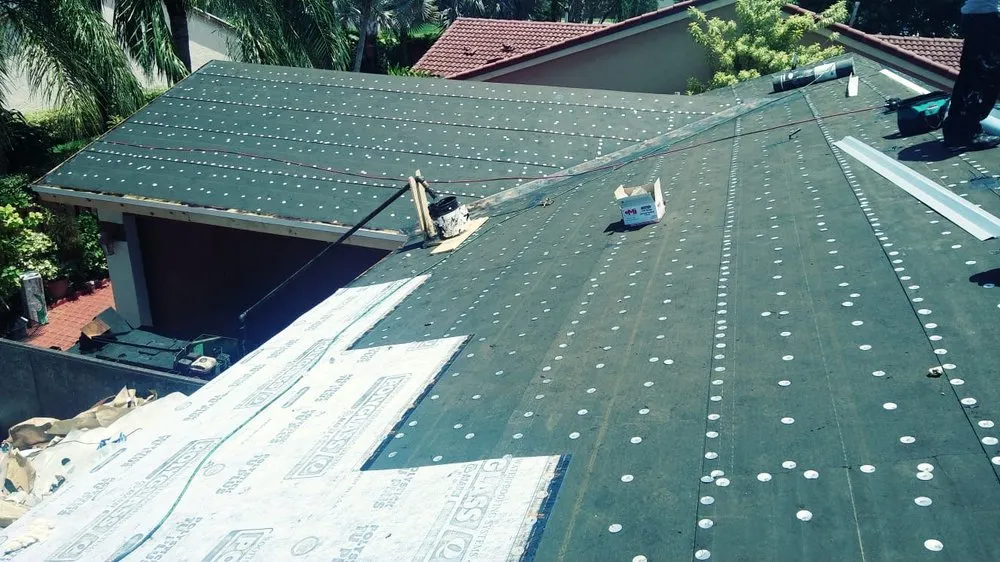 Slide of D-Tech Roofing