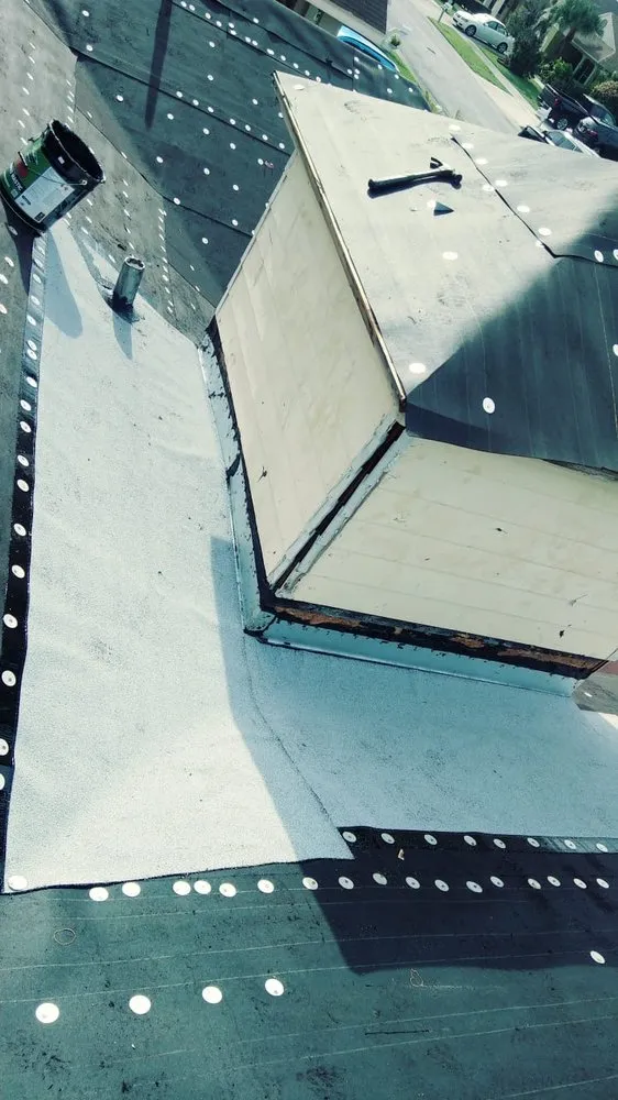 Slide of D-Tech Roofing