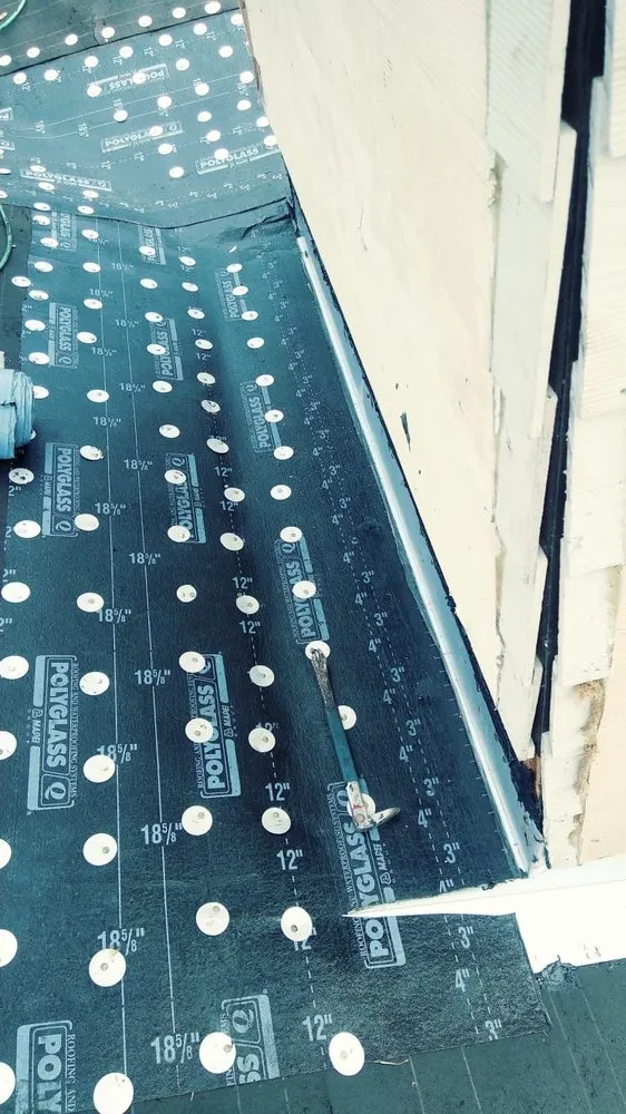 Slide of D-Tech Roofing