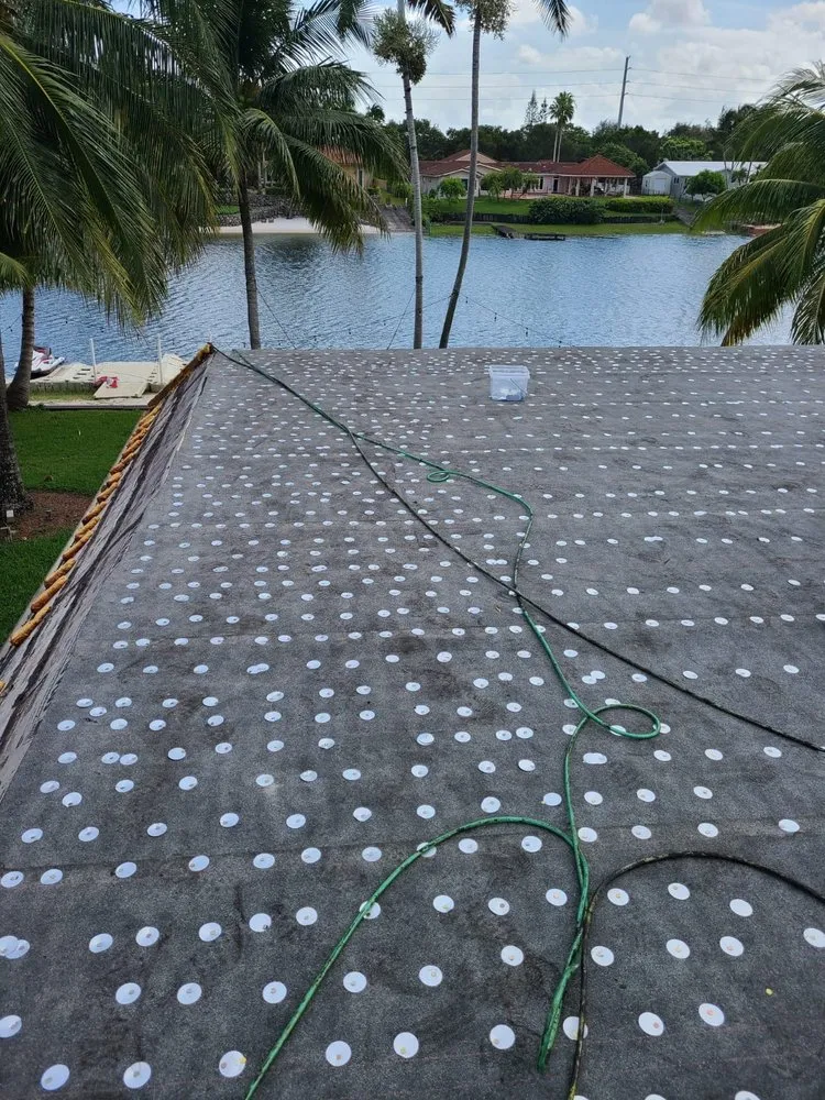 Slide of D-Tech Roofing