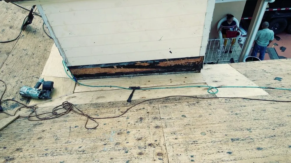 Slide of D-Tech Roofing