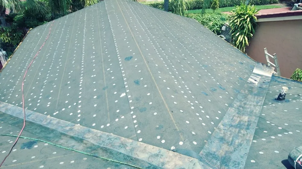 Slide of D-Tech Roofing