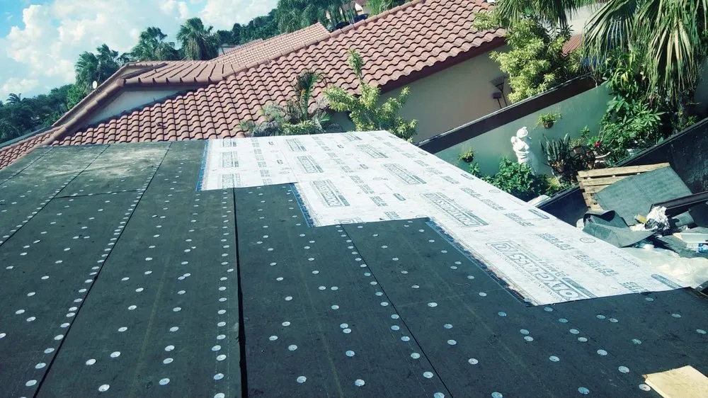 Slide of D-Tech Roofing