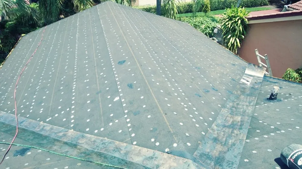 Slide of D-Tech Roofing