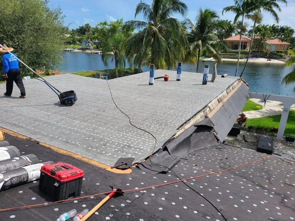 Slide of D-Tech Roofing