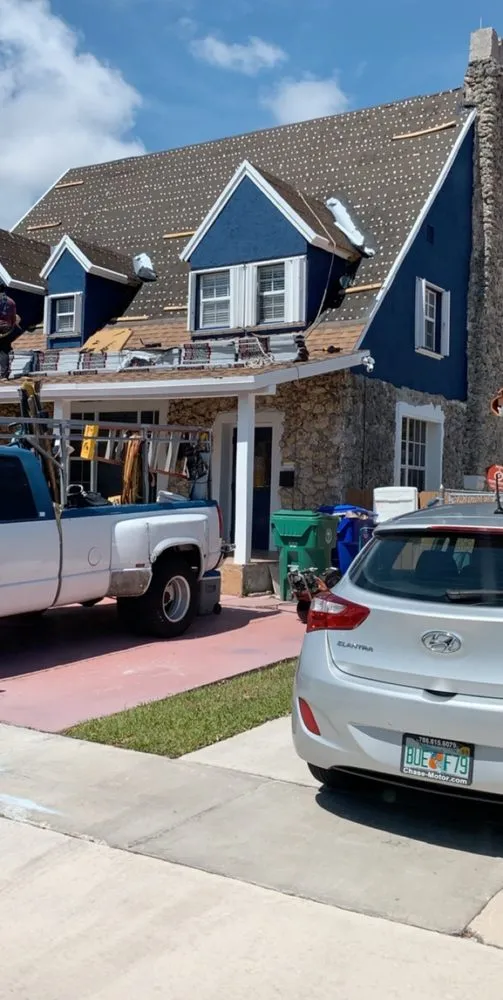 Slide of D-Tech Roofing