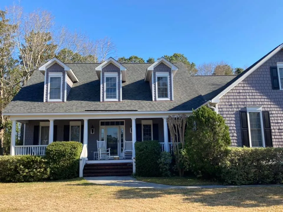 Slide of D. Thomas Roofing