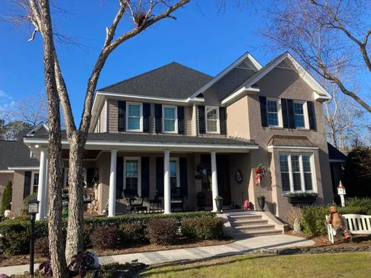 D. Thomas Roofing Logo