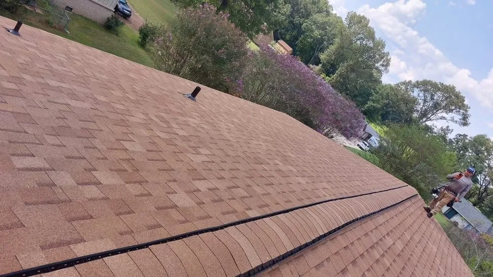 Slide of DAB Roofing