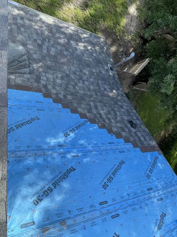 Slide of Dacoma Roofing