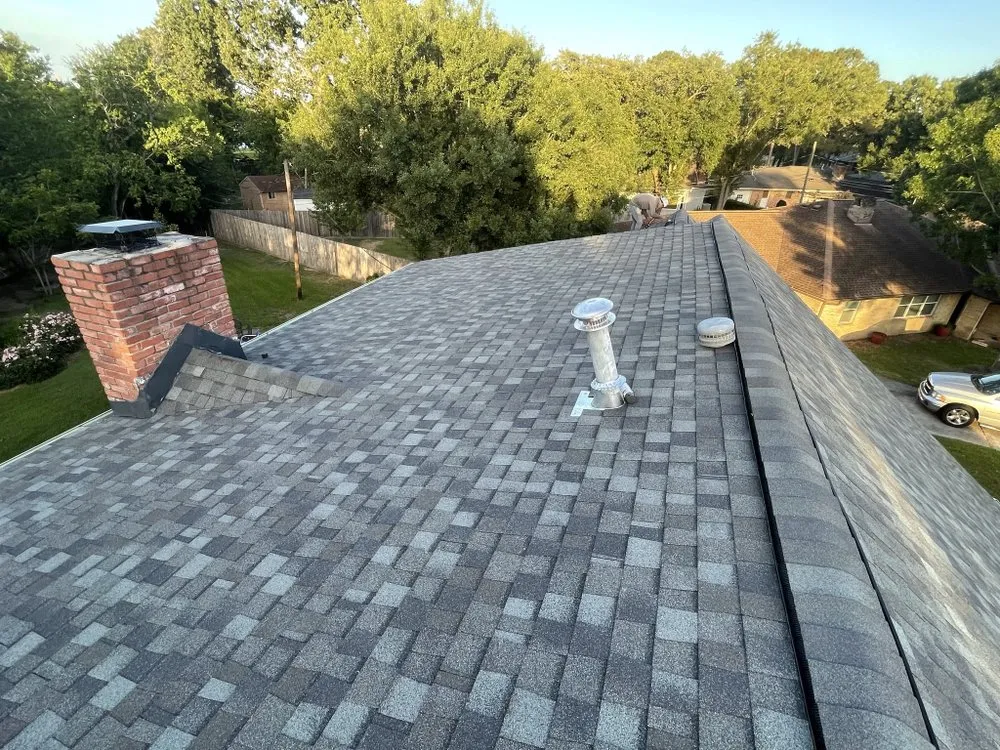 Slide of Dacoma Roofing