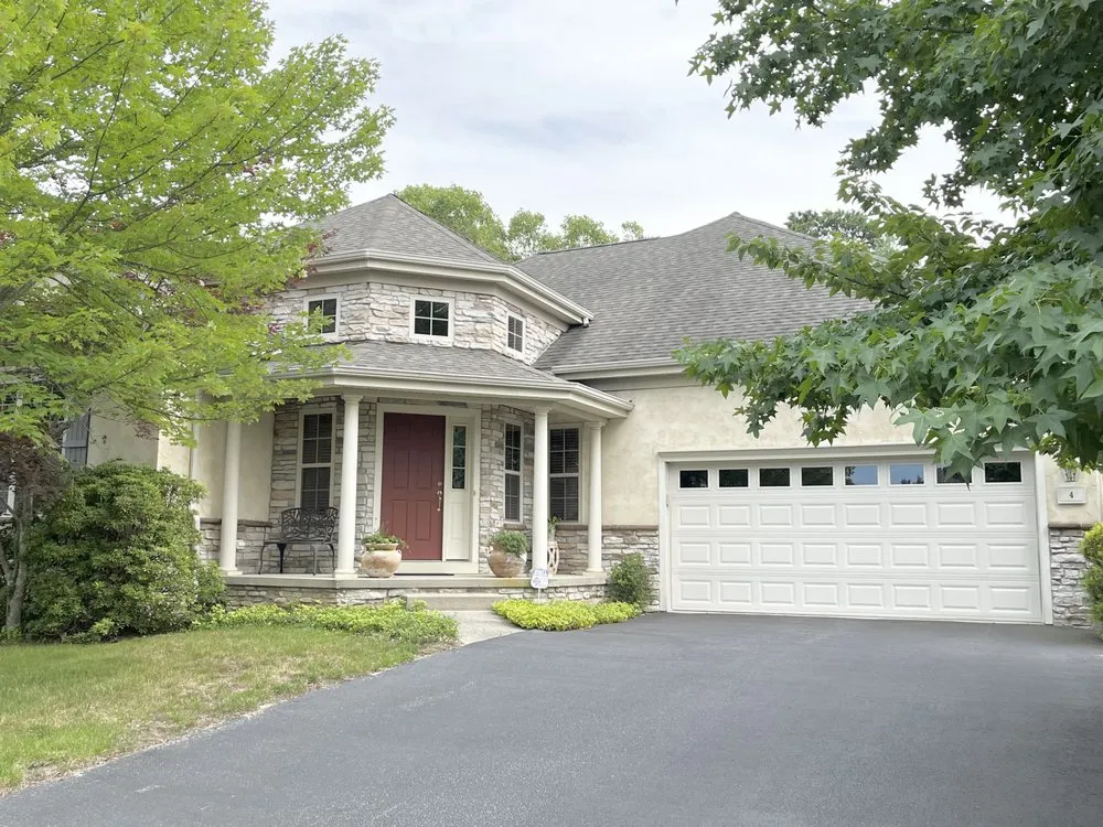 Local storm damage roof repair for fast service in Stafford Township, NJ by Dam Good Roofing
