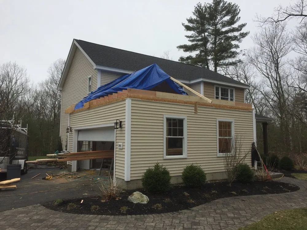 Slide of Damphousse Roofing