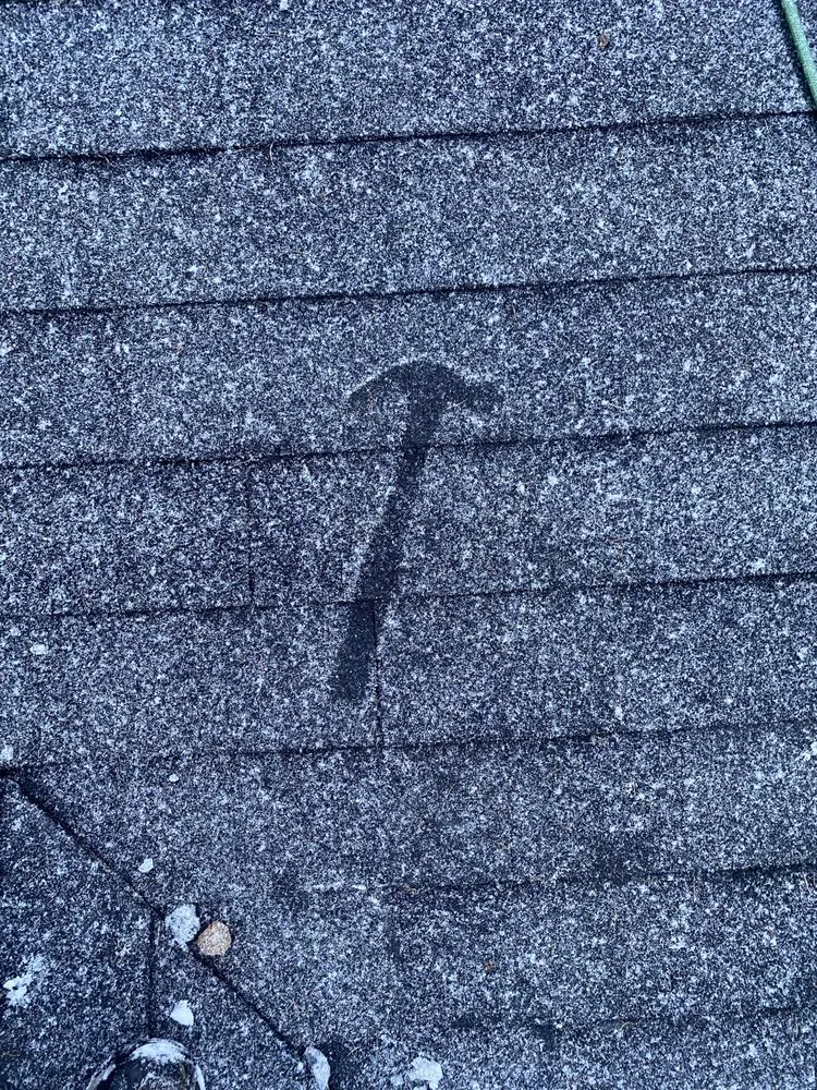 Slide of Dan Benson Roofing