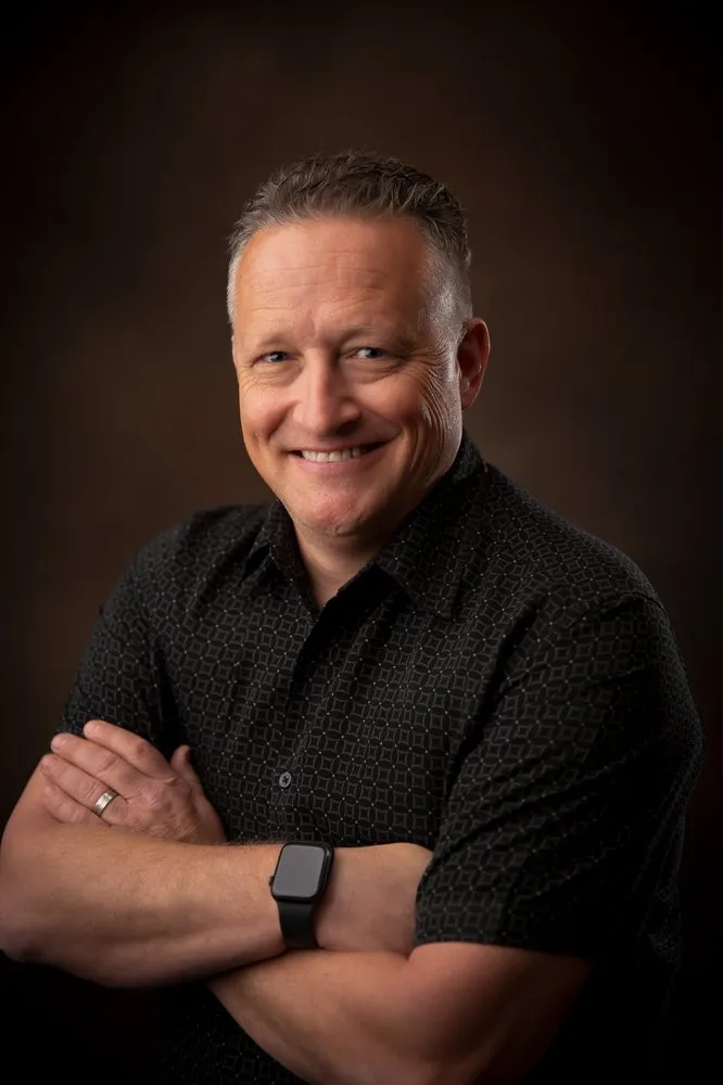 Slide of Dan Elliott's Roofing Company