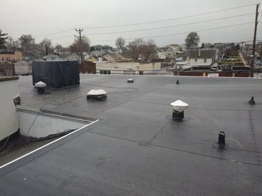 Dan Kurela Roofing Logo