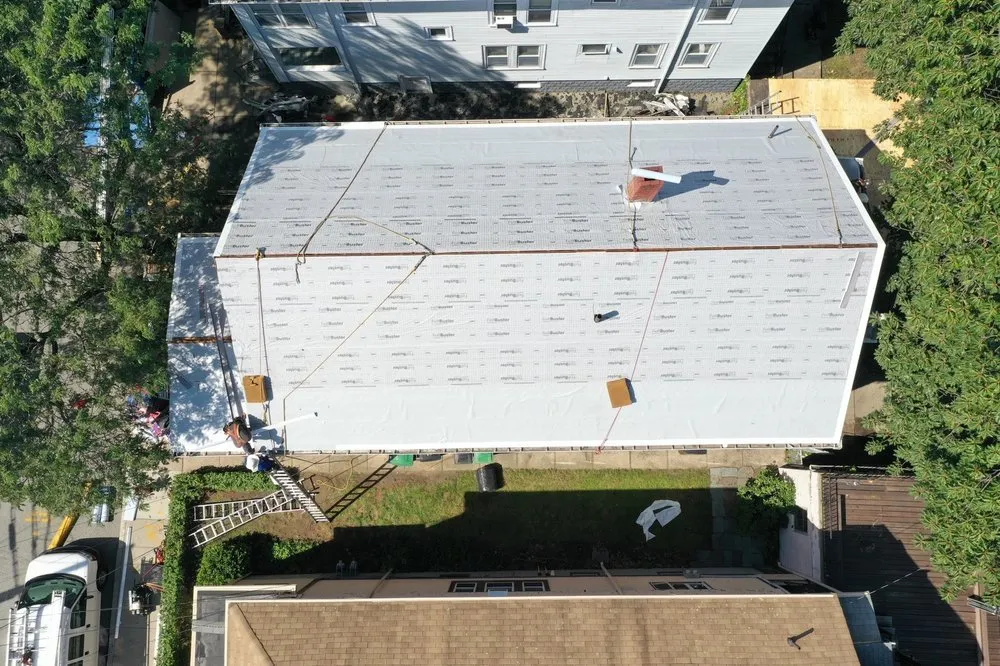 Slide of Dan Roofing