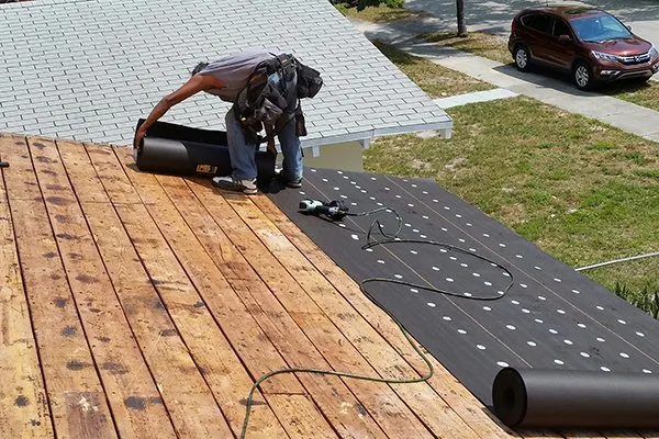 Slide of Dan Tennis Roofing