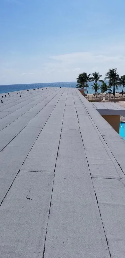 Slide of Dan Tennis Roofing