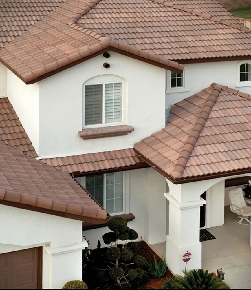 Slide of Dan Tennis Roofing