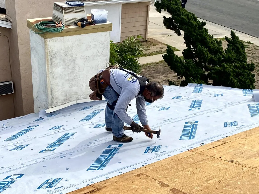 Slide of Dana Logsdon Roofing & Solar