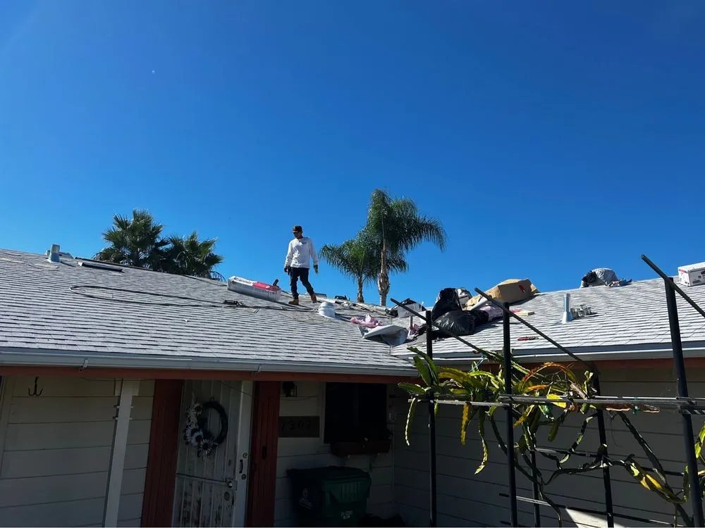 Slide of Dana Logsdon Roofing & Solar