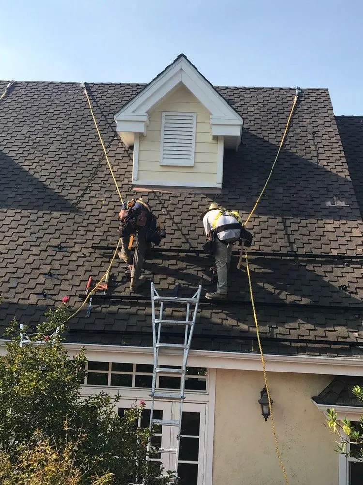 Slide of Dana Logsdon Roofing & Solar