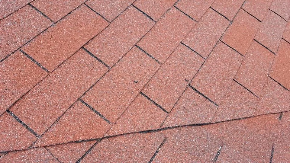 Slide of Dane Roofing