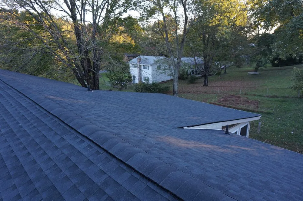 Slide of Daniel Hood Roofing