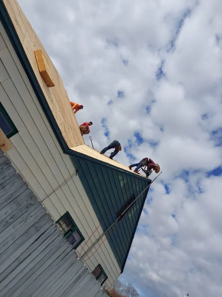 Slide of Daniel's Roofing and Painting
