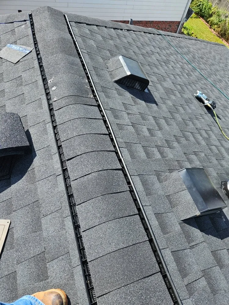 Slide of Daniel's Roofing and Painting