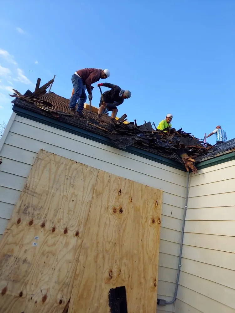 Slide of Daniel's Roofing and Painting