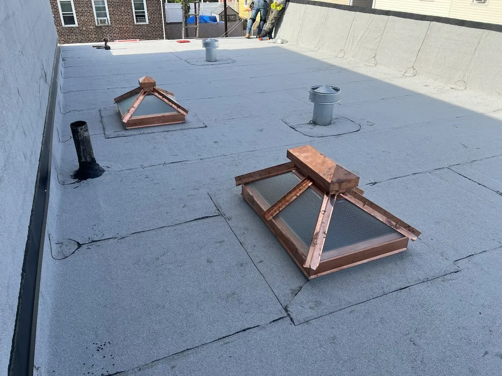 Local roof leak repair after storm damage in Glendale, NY by Daniel's Roofing