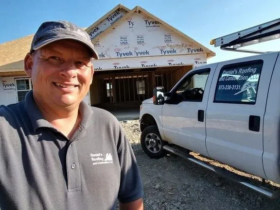 Slide of Daniel's Roofing