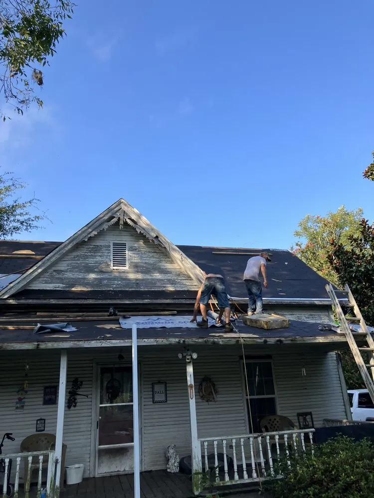 Slide of Danny Smiths Roofing