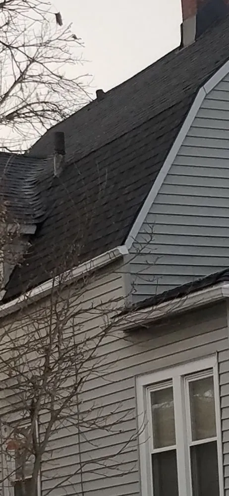 Slide of Danny's Roofing