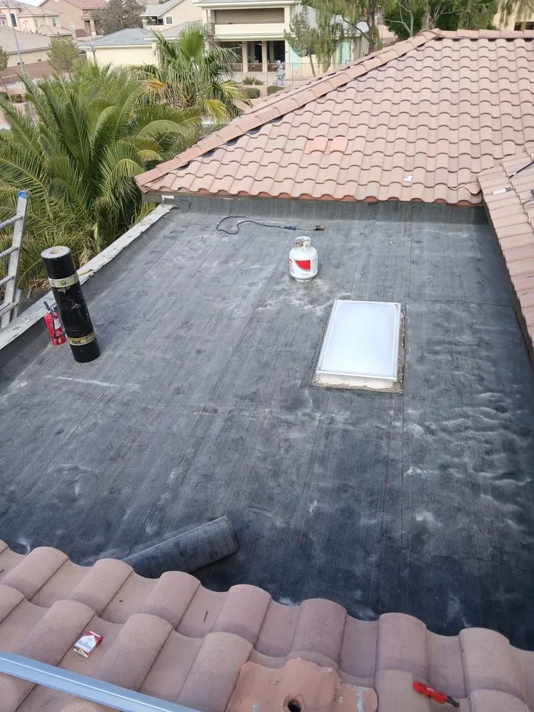 Slide of Danny's Roofing Service